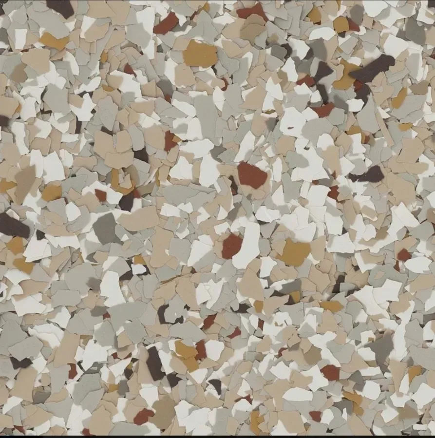 A swatch for flake flooring in the color Creekbed.