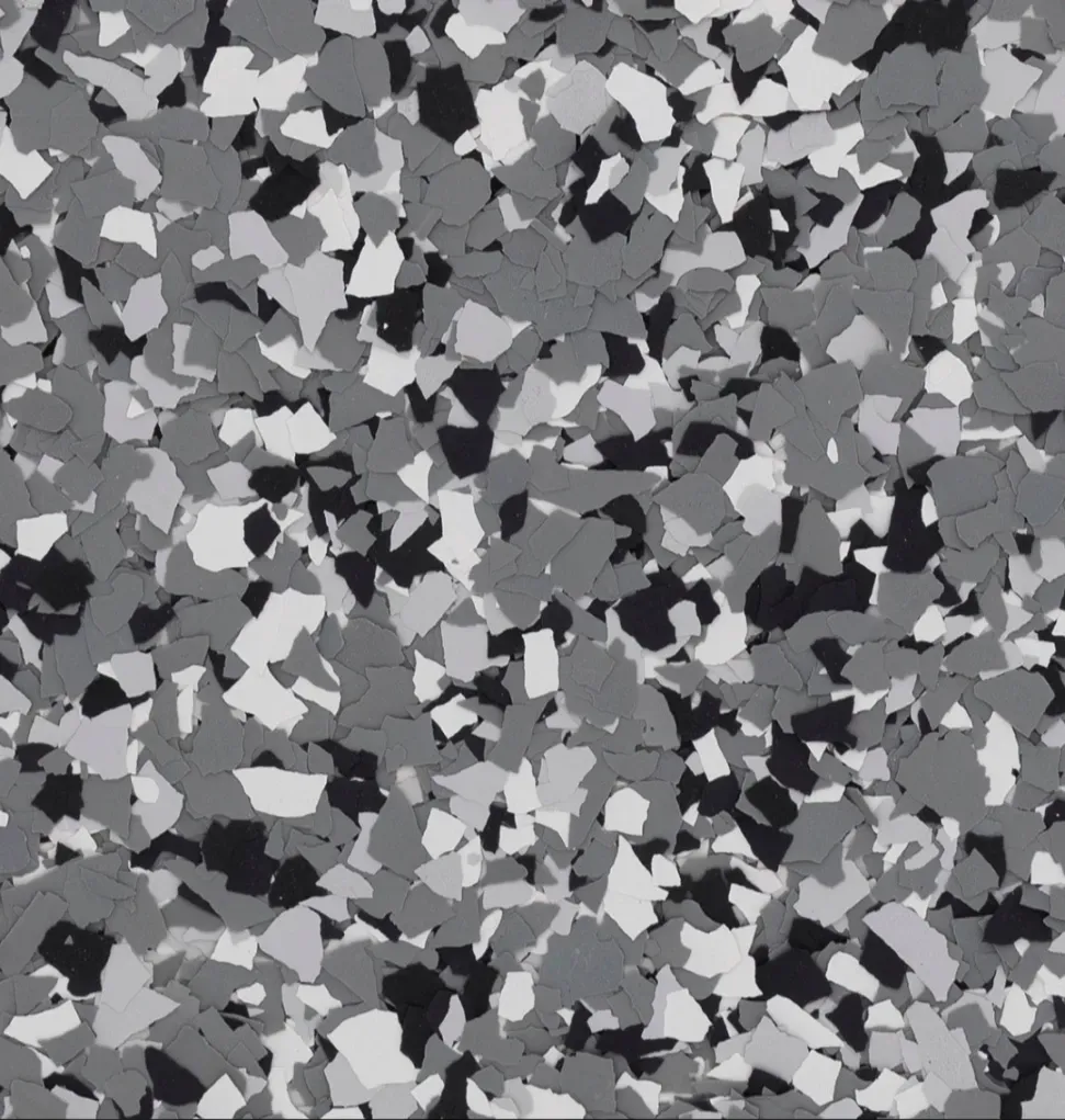 A swatch for flake flooring in the color Wombat.