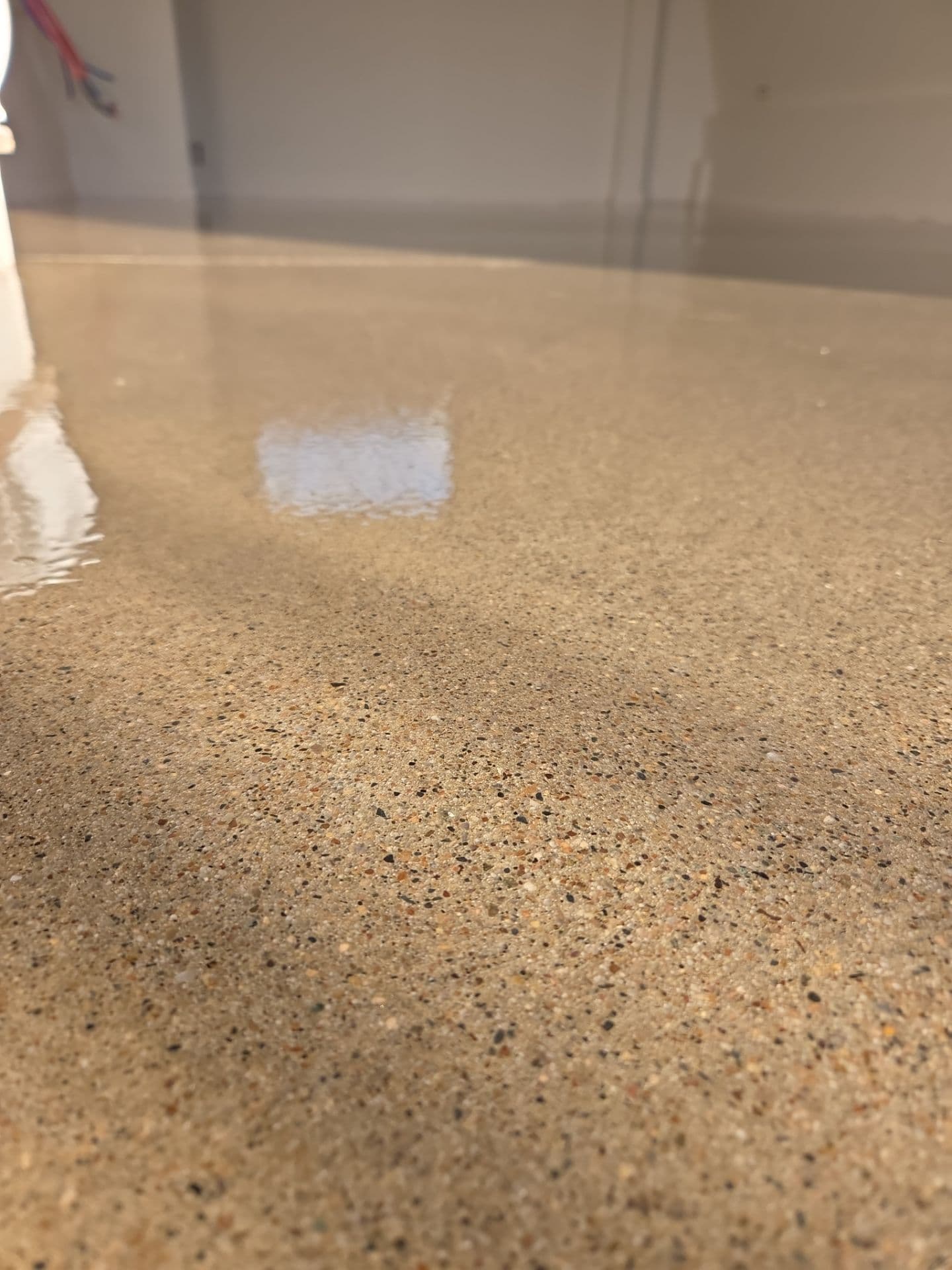 Newly-installed Grind and Seal concrete flooring.