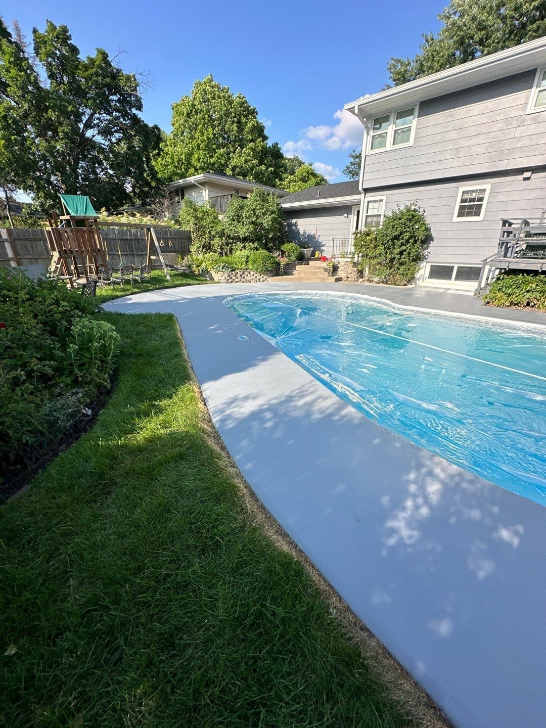 A newly-coated Polyaspartic pool deck.